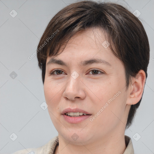 Joyful white young-adult female with medium  brown hair and brown eyes