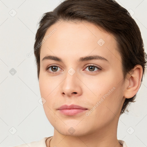 Neutral white young-adult female with short  brown hair and brown eyes