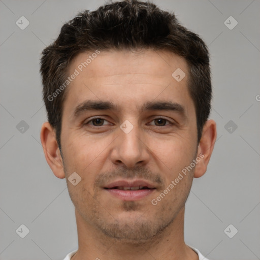 Joyful white young-adult male with short  brown hair and brown eyes