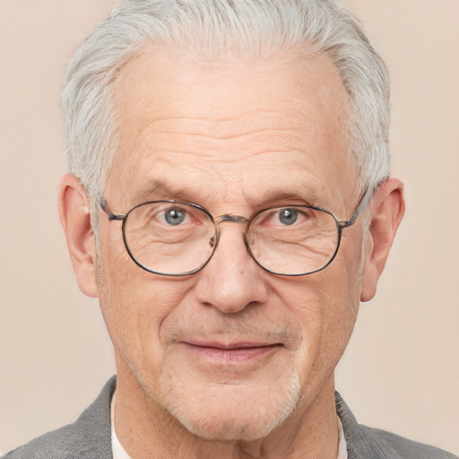 Joyful white middle-aged male with short  gray hair and brown eyes