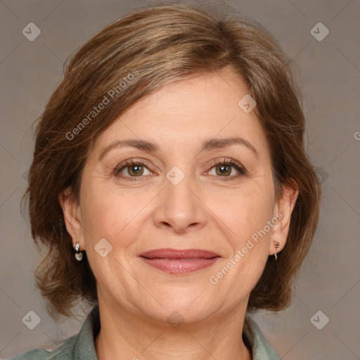 Joyful white adult female with medium  brown hair and grey eyes