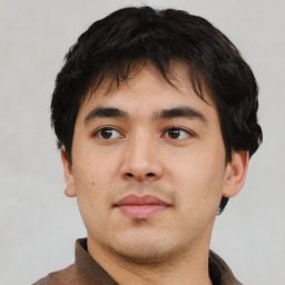 Neutral white young-adult male with short  black hair and brown eyes
