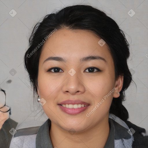 Joyful asian young-adult female with medium  black hair and brown eyes