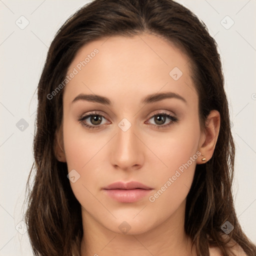 Neutral white young-adult female with long  brown hair and brown eyes