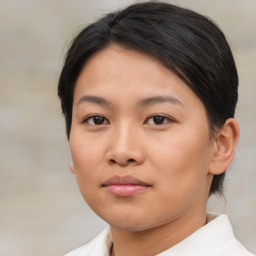 Neutral asian young-adult female with medium  brown hair and brown eyes