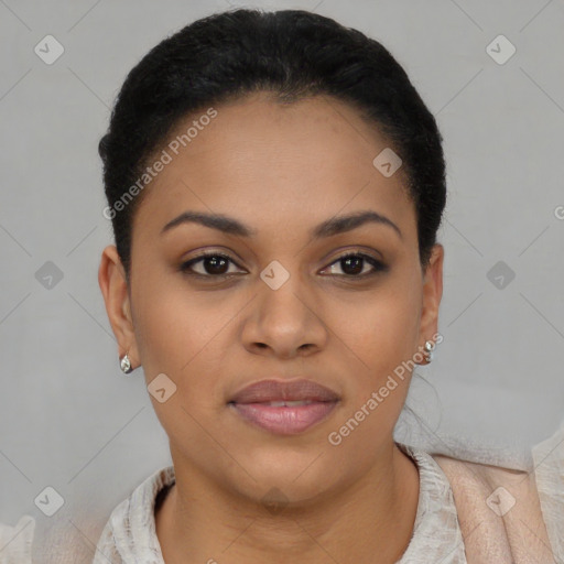 Joyful black young-adult female with short  black hair and brown eyes