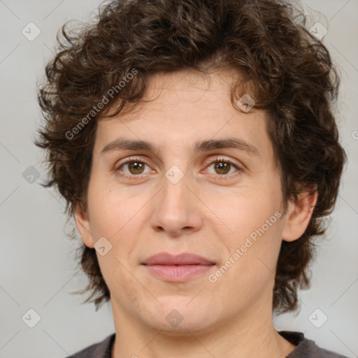 Joyful white young-adult male with medium  brown hair and brown eyes