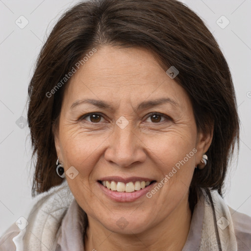 Joyful white adult female with medium  brown hair and brown eyes