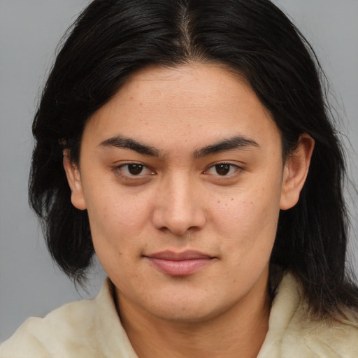 Joyful asian young-adult female with medium  brown hair and brown eyes