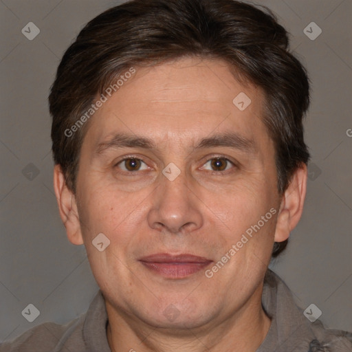 Joyful white adult male with short  brown hair and brown eyes