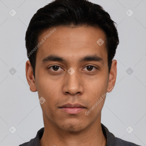 Neutral latino young-adult male with short  black hair and brown eyes