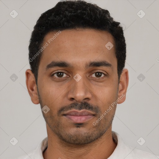Neutral latino young-adult male with short  black hair and brown eyes