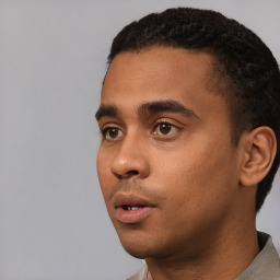 Neutral white young-adult male with short  black hair and brown eyes