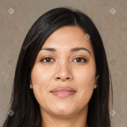 Joyful latino young-adult female with long  black hair and brown eyes