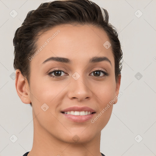 Joyful white young-adult female with short  brown hair and brown eyes