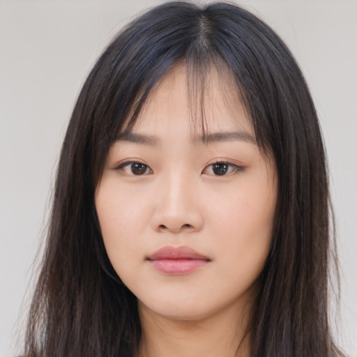 Neutral asian young-adult female with long  brown hair and brown eyes