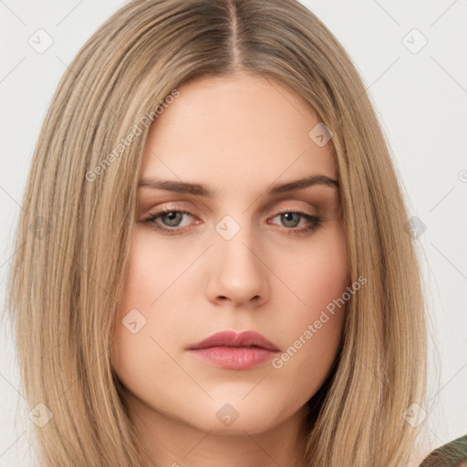 Neutral white young-adult female with long  brown hair and brown eyes