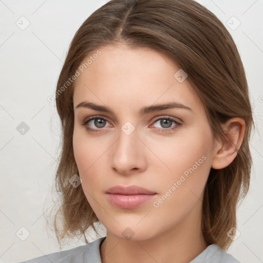 Neutral white young-adult female with medium  brown hair and brown eyes