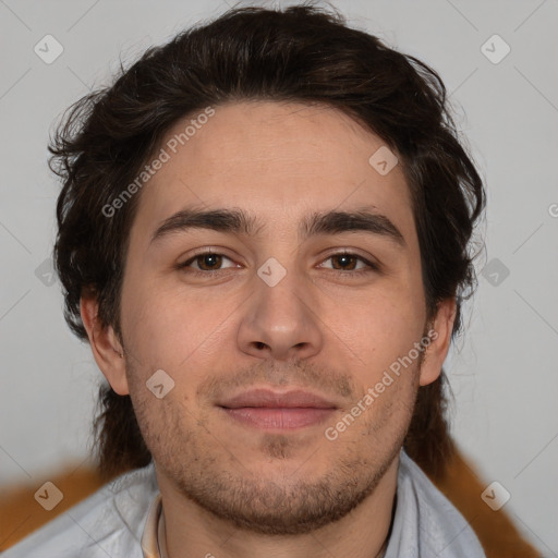 Joyful white adult male with short  brown hair and brown eyes