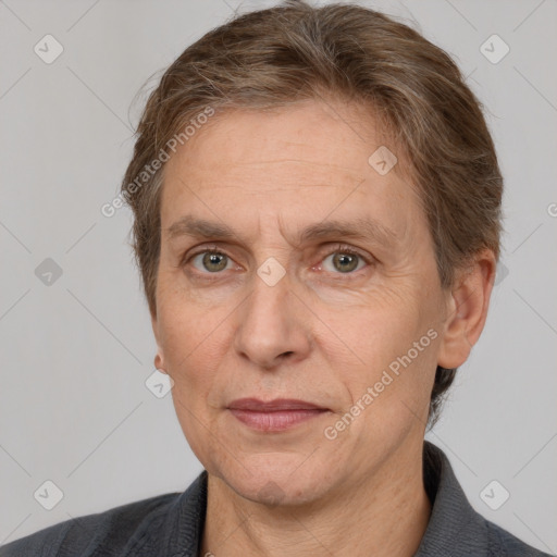 Joyful white adult male with short  brown hair and grey eyes