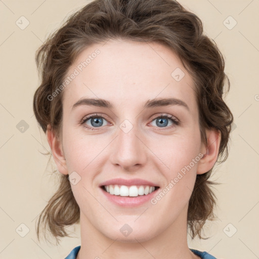 Joyful white young-adult female with medium  brown hair and blue eyes