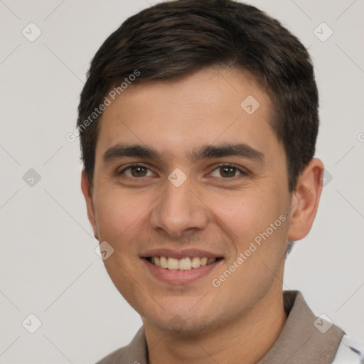 Joyful white young-adult male with short  brown hair and brown eyes