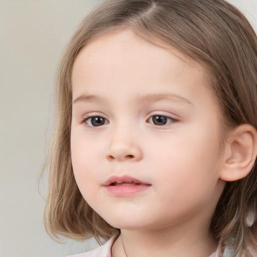 Neutral white child female with medium  brown hair and brown eyes