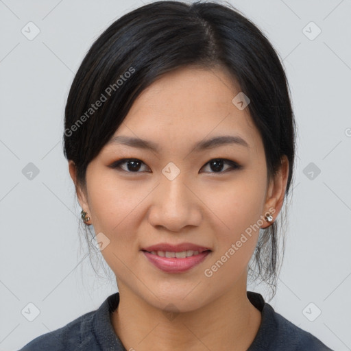 Joyful asian young-adult female with medium  black hair and brown eyes