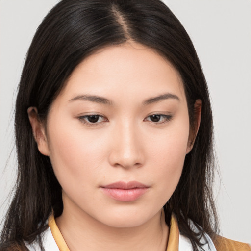 Neutral asian young-adult female with medium  brown hair and brown eyes