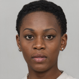 Neutral black young-adult female with short  brown hair and brown eyes