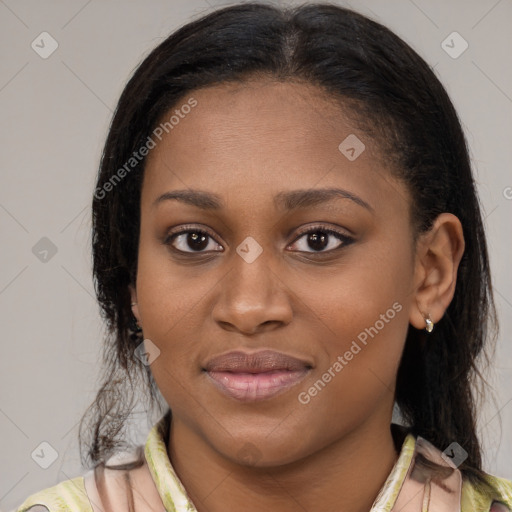 Joyful latino young-adult female with medium  brown hair and brown eyes