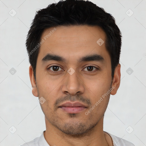 Neutral latino young-adult male with short  black hair and brown eyes