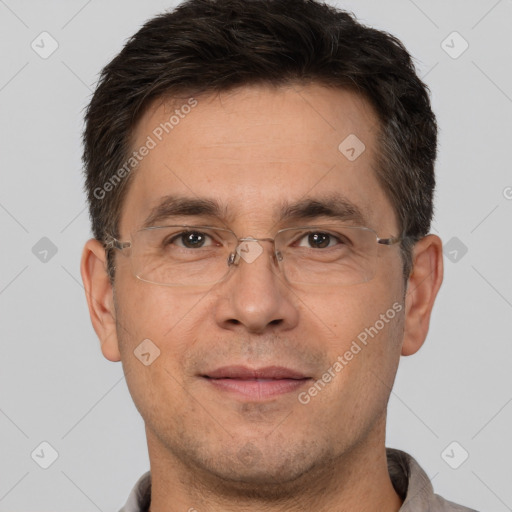 Joyful white adult male with short  brown hair and brown eyes