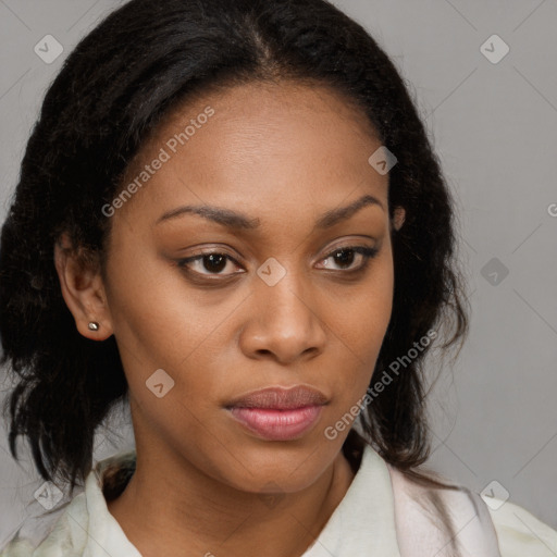 Joyful black young-adult female with long  brown hair and brown eyes