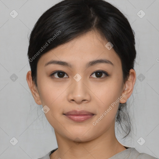 Joyful asian young-adult female with medium  black hair and brown eyes