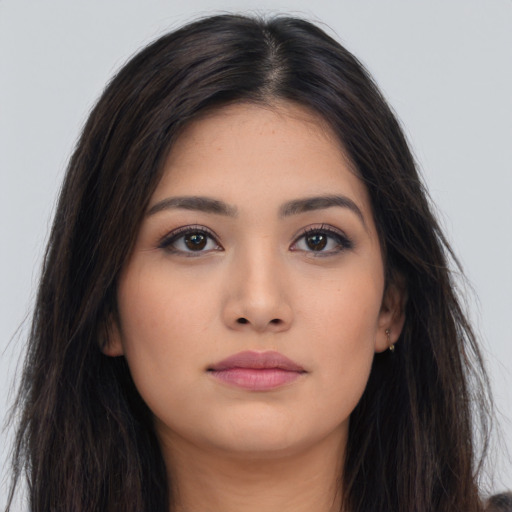 Neutral asian young-adult female with long  brown hair and brown eyes