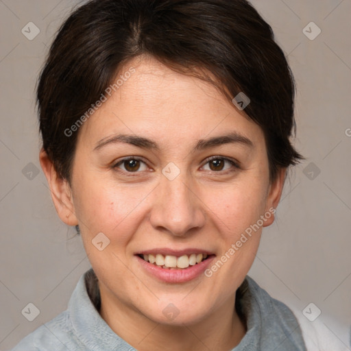 Joyful white adult female with medium  brown hair and brown eyes