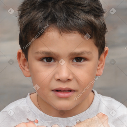 Joyful white child male with short  brown hair and brown eyes