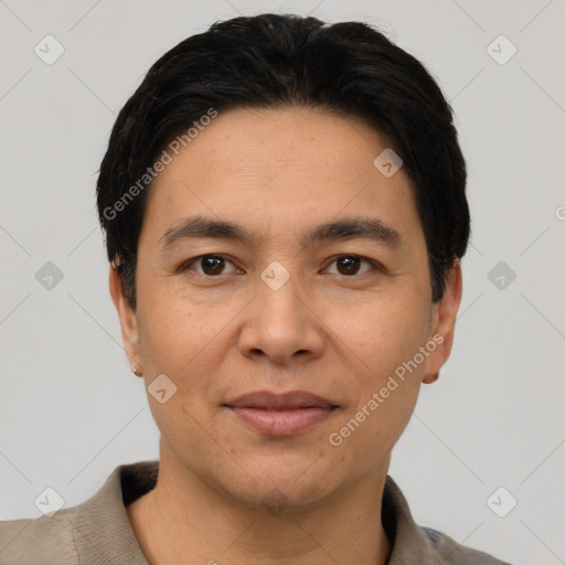 Joyful white adult male with short  black hair and brown eyes