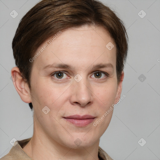 Joyful white young-adult female with short  brown hair and grey eyes