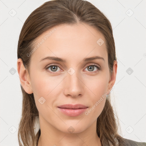 Joyful white young-adult female with long  brown hair and grey eyes