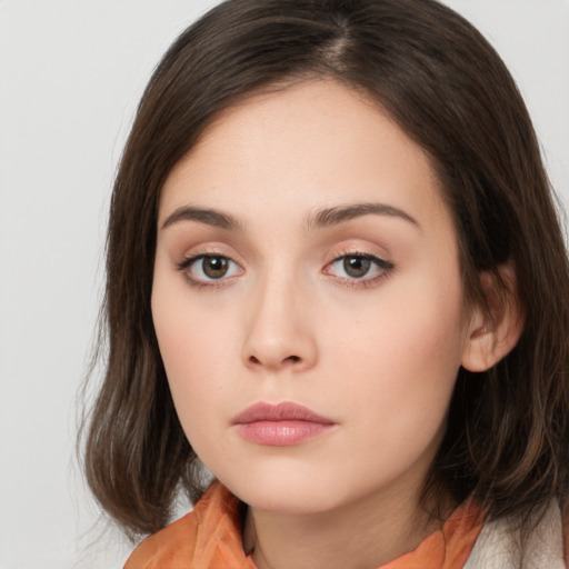 Neutral white young-adult female with medium  brown hair and brown eyes