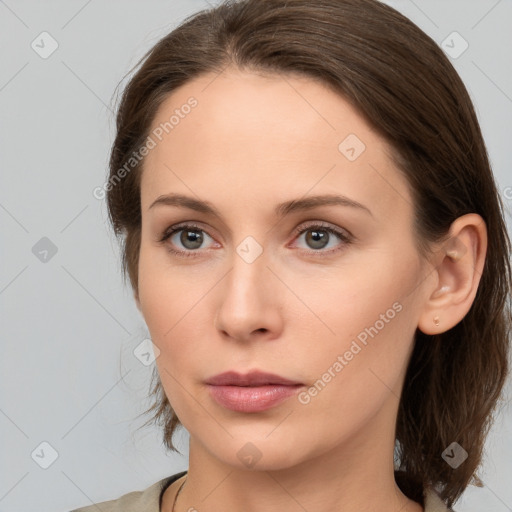 Neutral white young-adult female with medium  brown hair and brown eyes