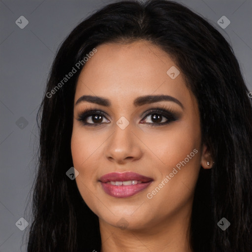 Joyful latino young-adult female with long  black hair and brown eyes