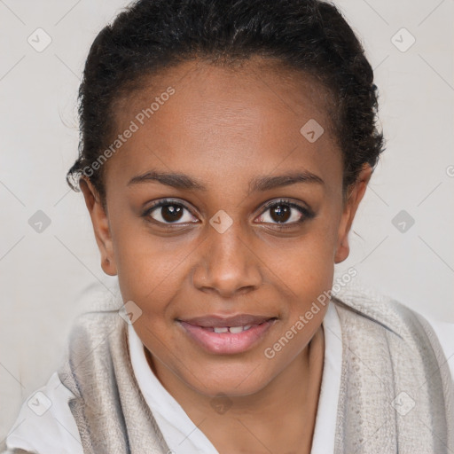 Joyful black young-adult female with short  brown hair and brown eyes