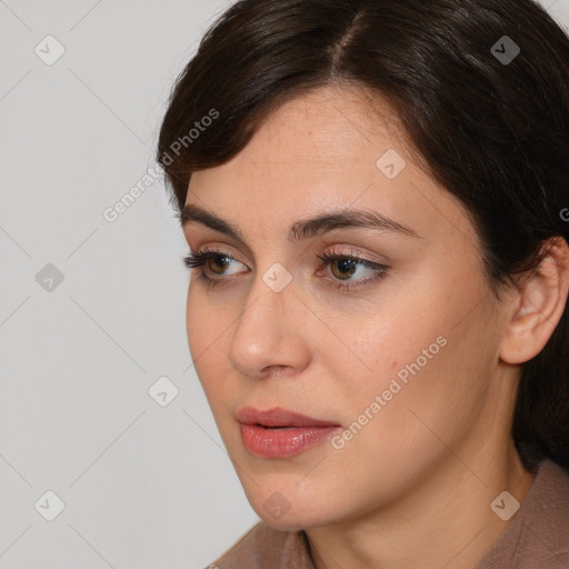 Neutral white young-adult female with medium  brown hair and brown eyes