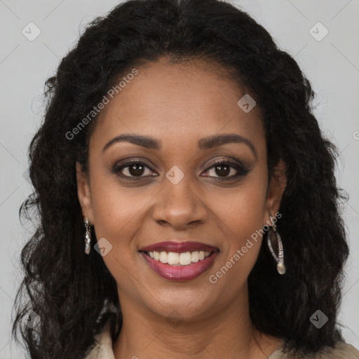 Joyful black young-adult female with long  brown hair and brown eyes