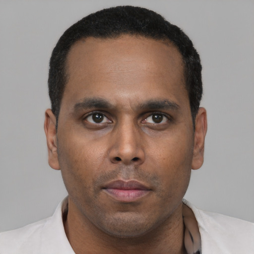 Neutral black young-adult male with short  brown hair and brown eyes