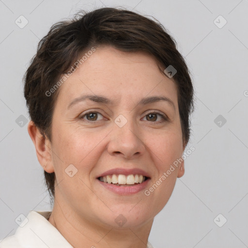 Joyful white young-adult female with short  brown hair and brown eyes