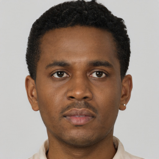 Neutral black young-adult male with short  brown hair and brown eyes